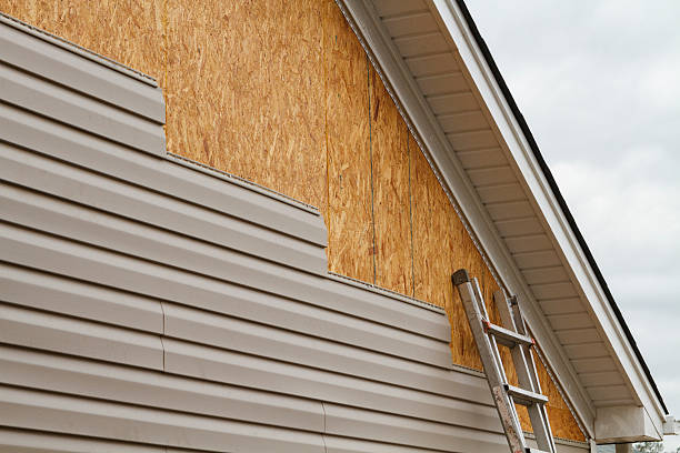 Professional Siding Replacement technician working in Evergreen, CO